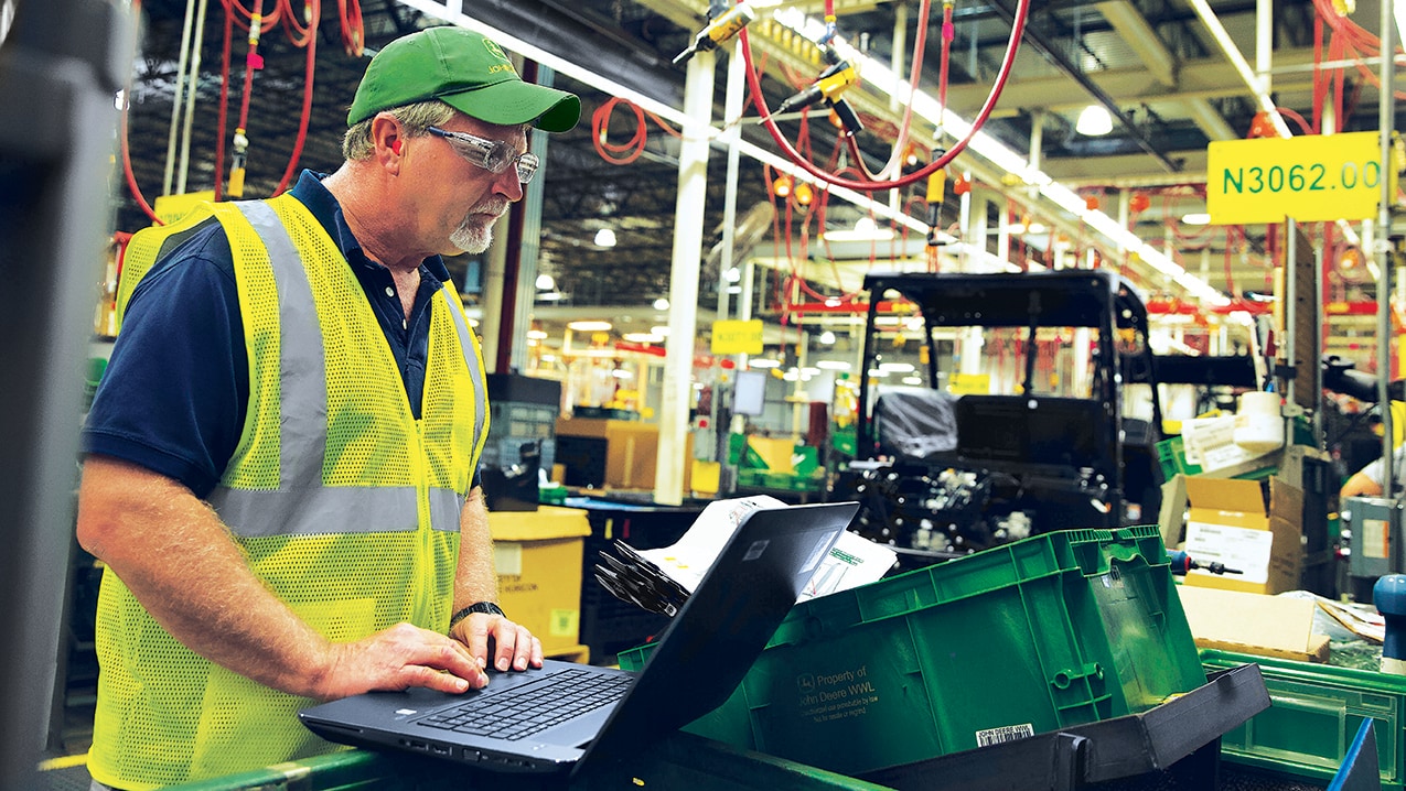 Electric machine mechanic working on John Deere equipment at Horicon Works