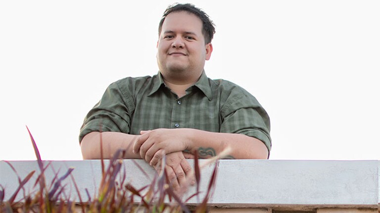 Rodolfo Corral on a balcony