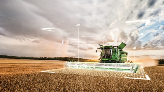 Combine in a field with holographic overlay of harvesting grid with software icons.