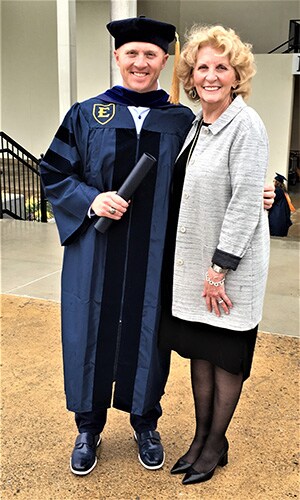 Carol and John Lewis and at his PhD graduation
