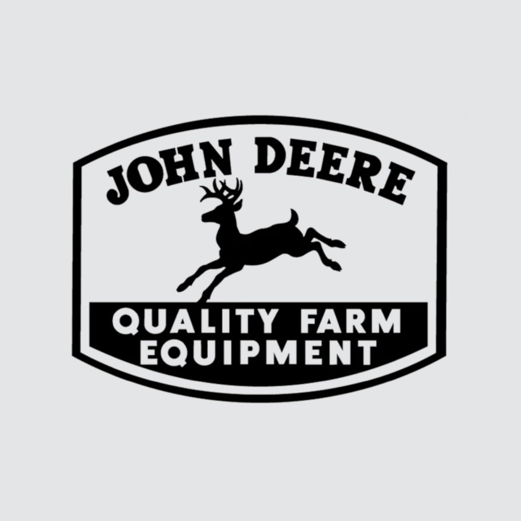 John Deere Logos Since 1876 Round-Tin Sign