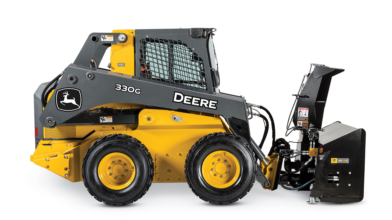Side view of the 330G Skid Steer Loader with SB78D Snow Blower attached to the front
