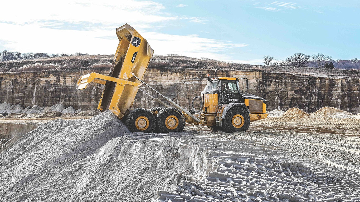 460E ADT dumping sand in a quarry