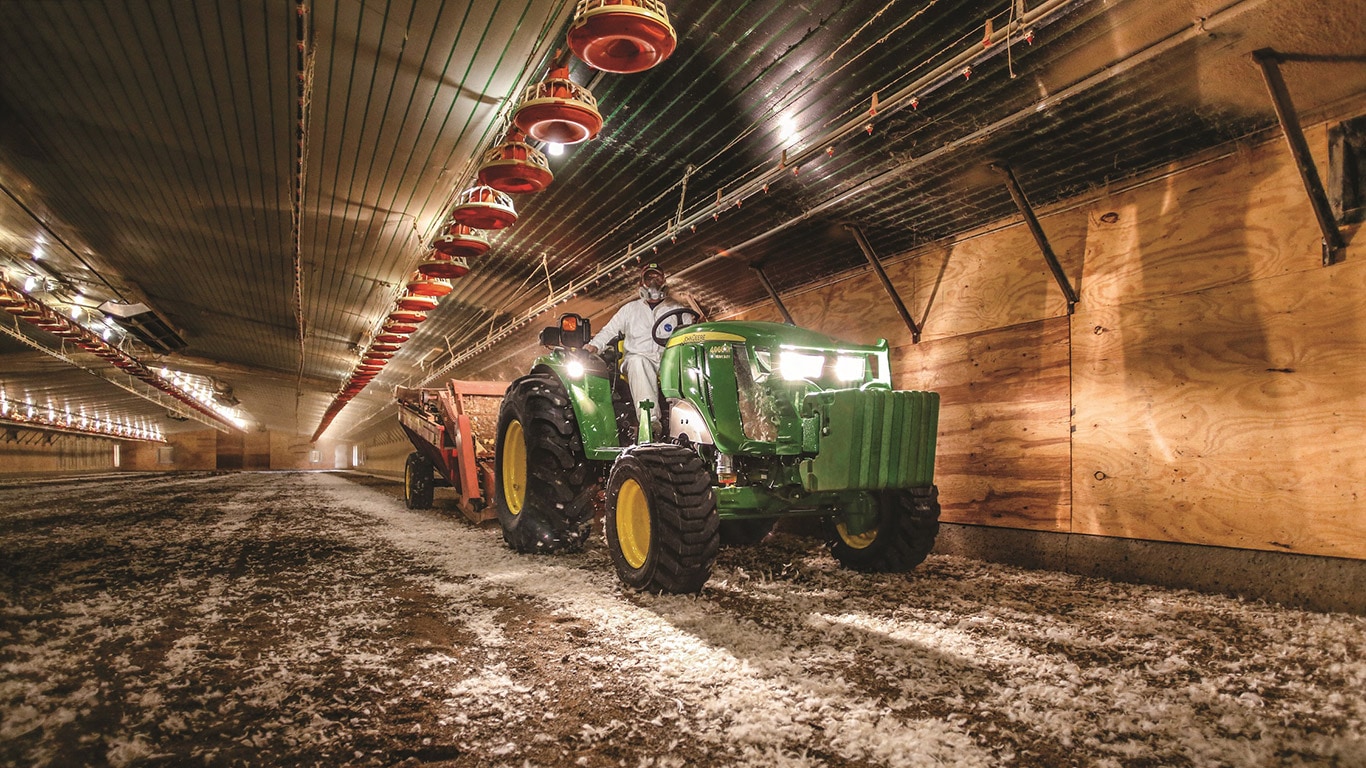 A man using the new M4 model inside a large barn