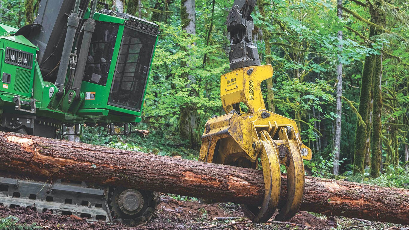 Image of the New FL100 Felling Head gripping timber.