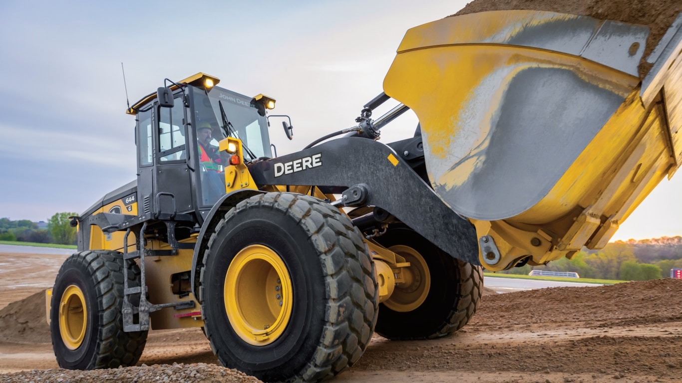 Large image of the John Deere 644 T-tier Wheel Loader on the job