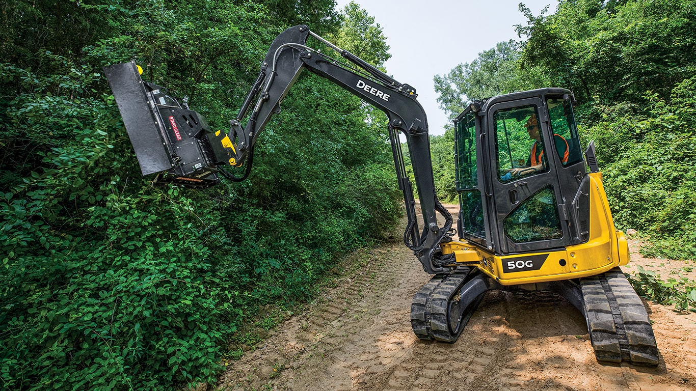 The John Deere RE40 and RE50 Rotary Brush Cutters are available as dealer installed kits for the 35, 50/60 and 75/85 model excavators.
