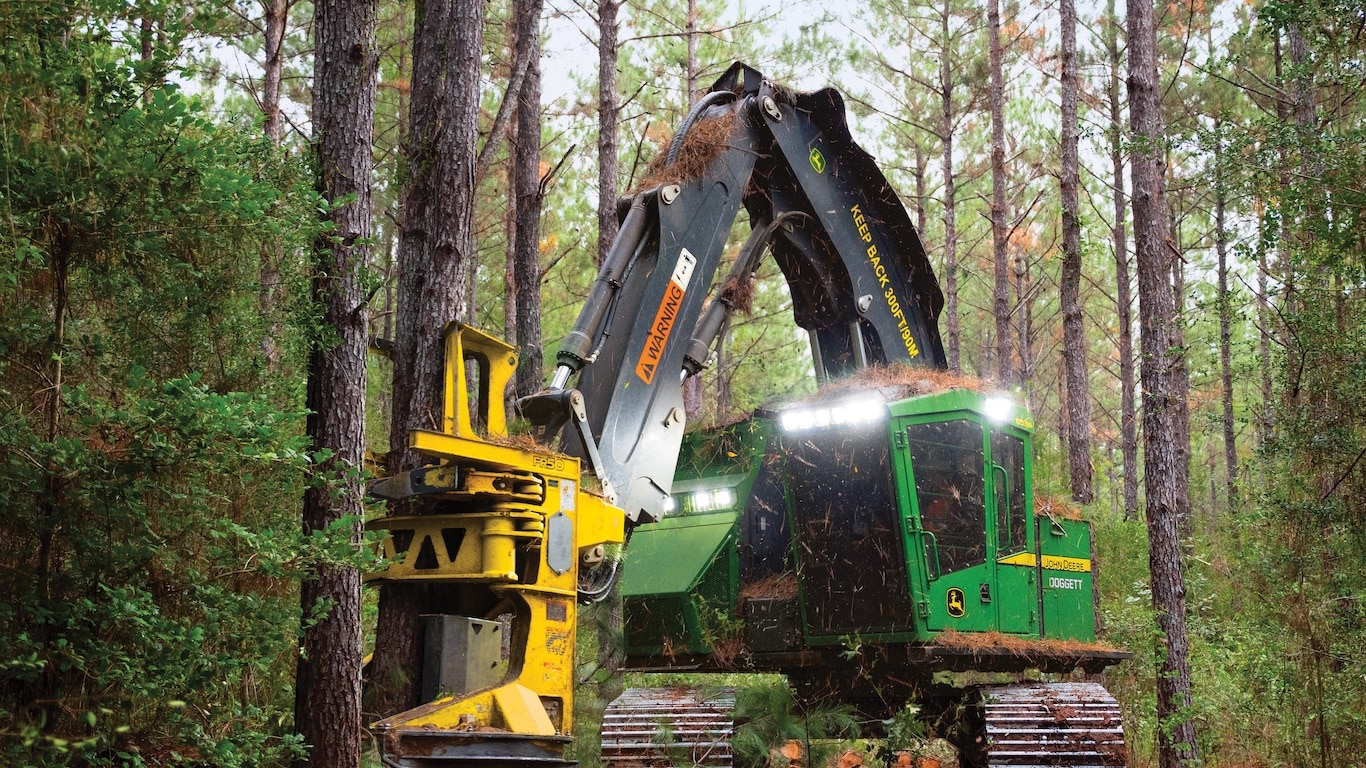 John Deere 853M Feller Buncher on a jobsite.
