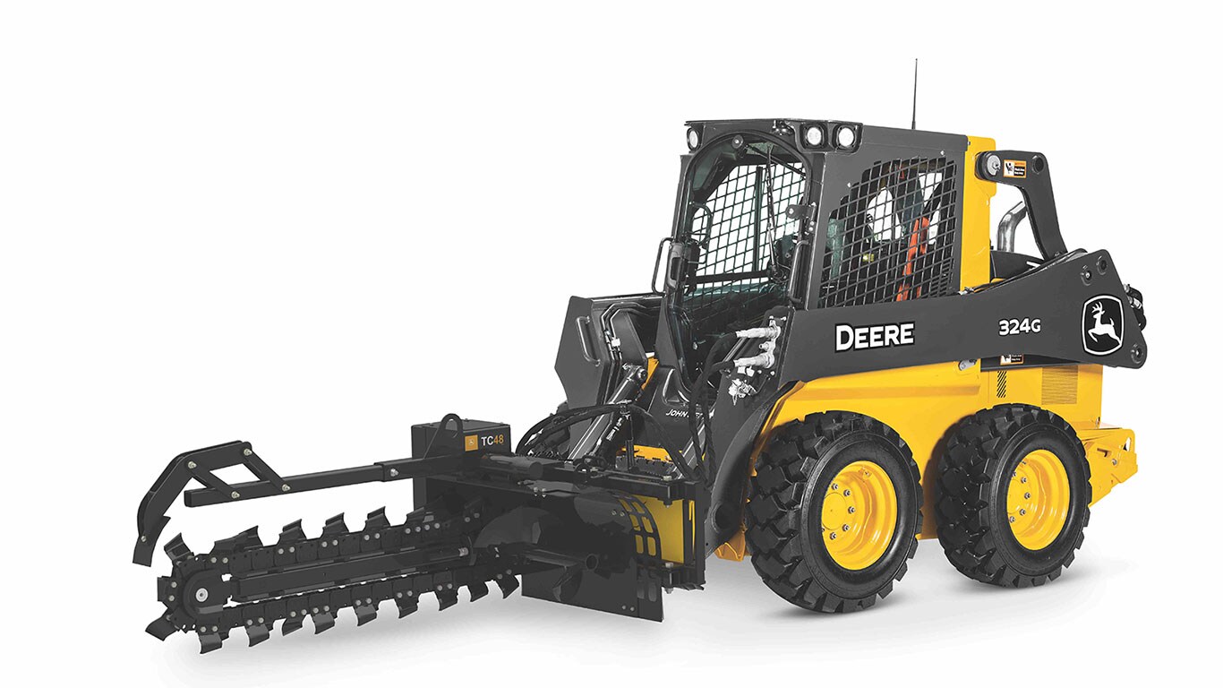 Studio shot of the TC48 trencher on a 324G skid steer