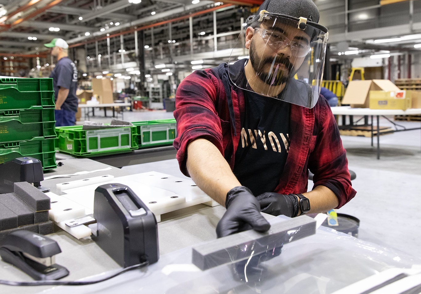 Deere assembler making protective face shield