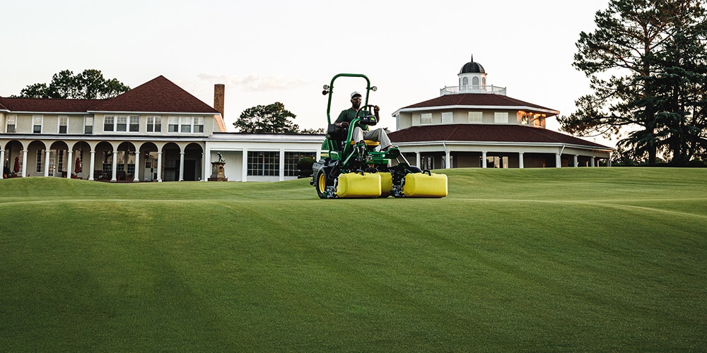 man mowing a fairway with John Deere 2700 Triplex