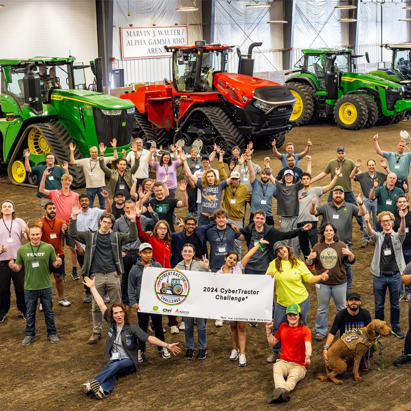 The group of CyberTractor Challenge participants in 2024 posing for a photo