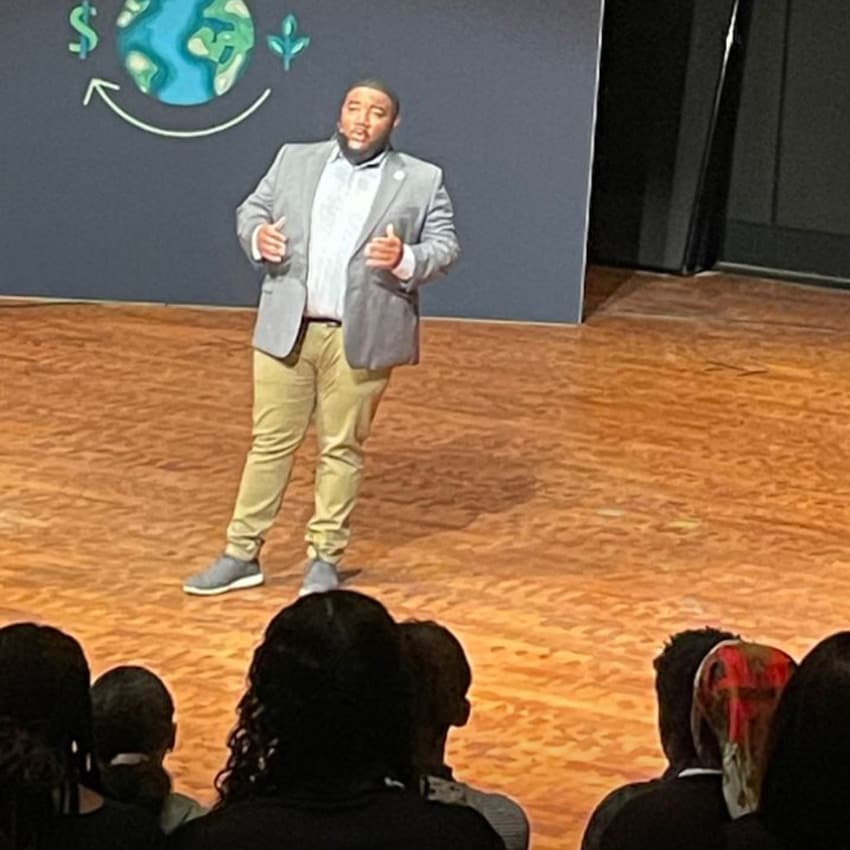 Jericho speaks to a crowded audience at the John Deere headquarters stage
