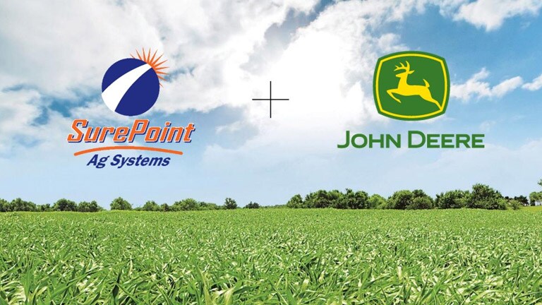 John Deere and Surepoint logos over the top of a sunny field
