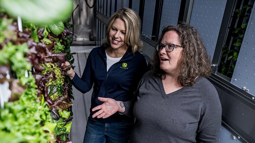 The Tapestry Farms Founder holding fresh vegetables