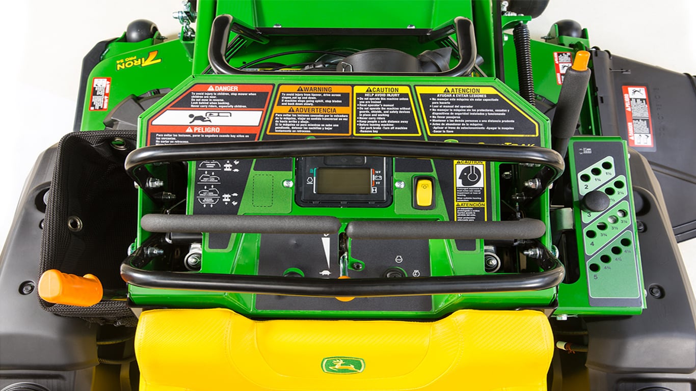 Photograph of QuikTrak mower warnings