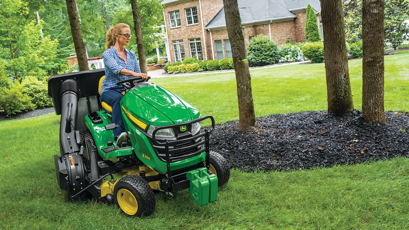 woman on a mower 