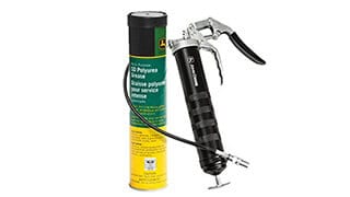 A John Deere Grease Gun with a flexible hose next to a tube of John Deere Polyurea Grease on a white background.