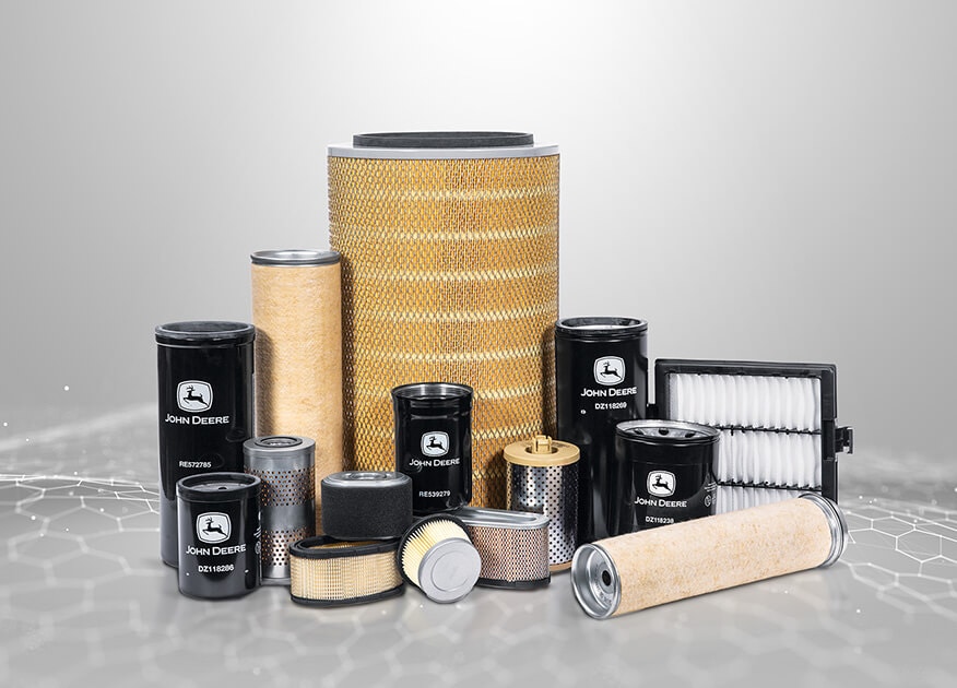A collection of John&nbsp;Deere oil, fuel, air, and hydraulic filters on a light gray background.