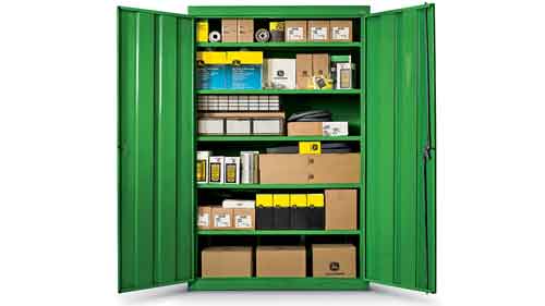  green metal cabinet with parts on all the shelves