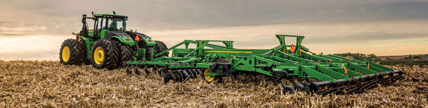 John&nbsp;Deere tractor pulling tillage equipment