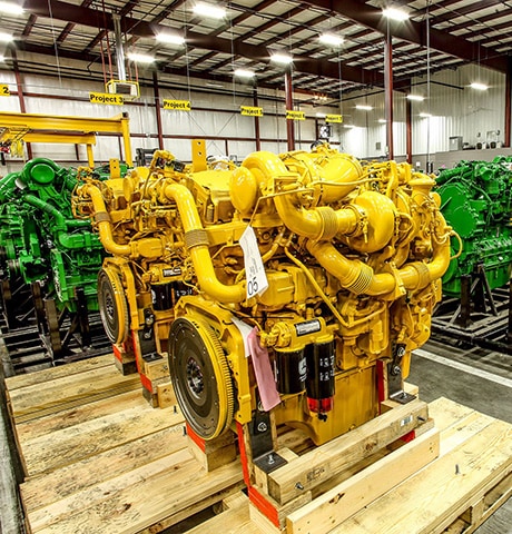 Remanufactured engines in the John Deere Reman warehouse.