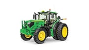Studio image of a large tractor on a white background.