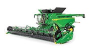 Studio image of a combine on a white background.