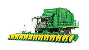 Studio image of a cotton harvester on a white background.