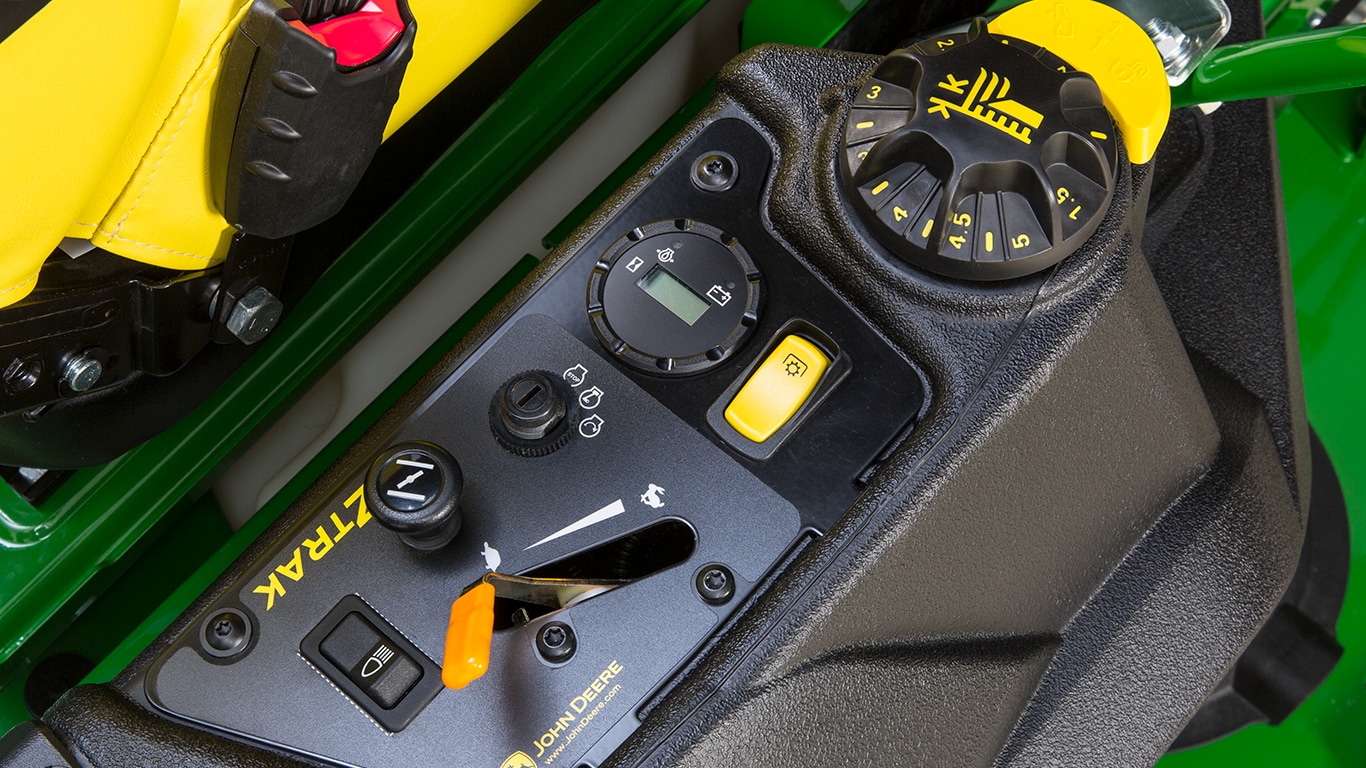 Closeup of a John Deere lawn mower control pannel