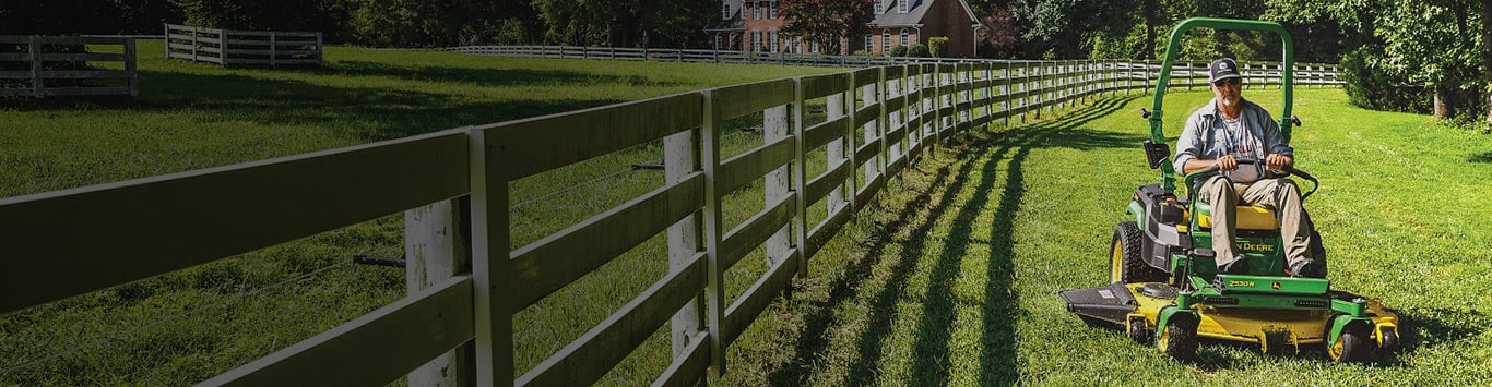 man mowing large yard with a ZeroTurn mower