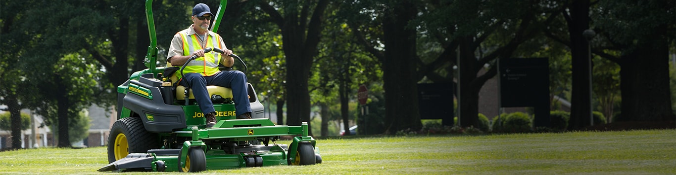 Man driving a z997r in a field