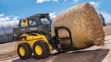 Bale hugger attachment on 332G Skid Steer