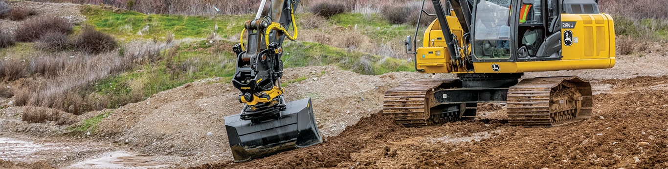 Plate compactor attachment on excavator