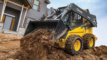 Construction bucket on 324G Skid Steer