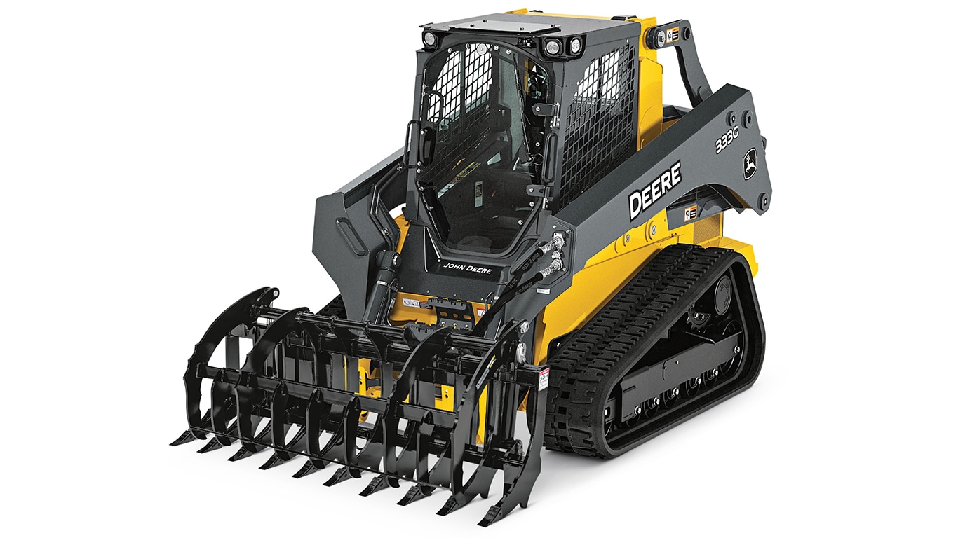 compact track loader with rake attachment