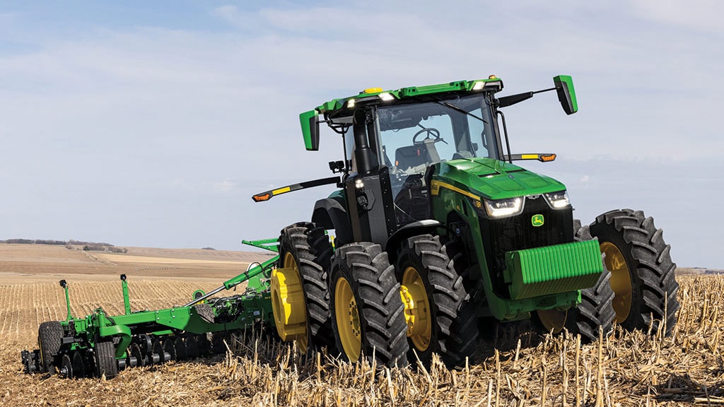 Autonomous Tractor doing tillage in a field of corn stubble