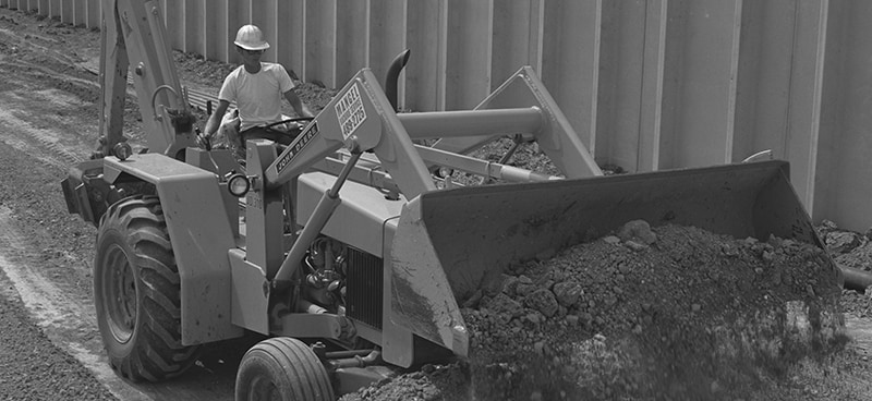 black and white image of 310 backhoe in 1971