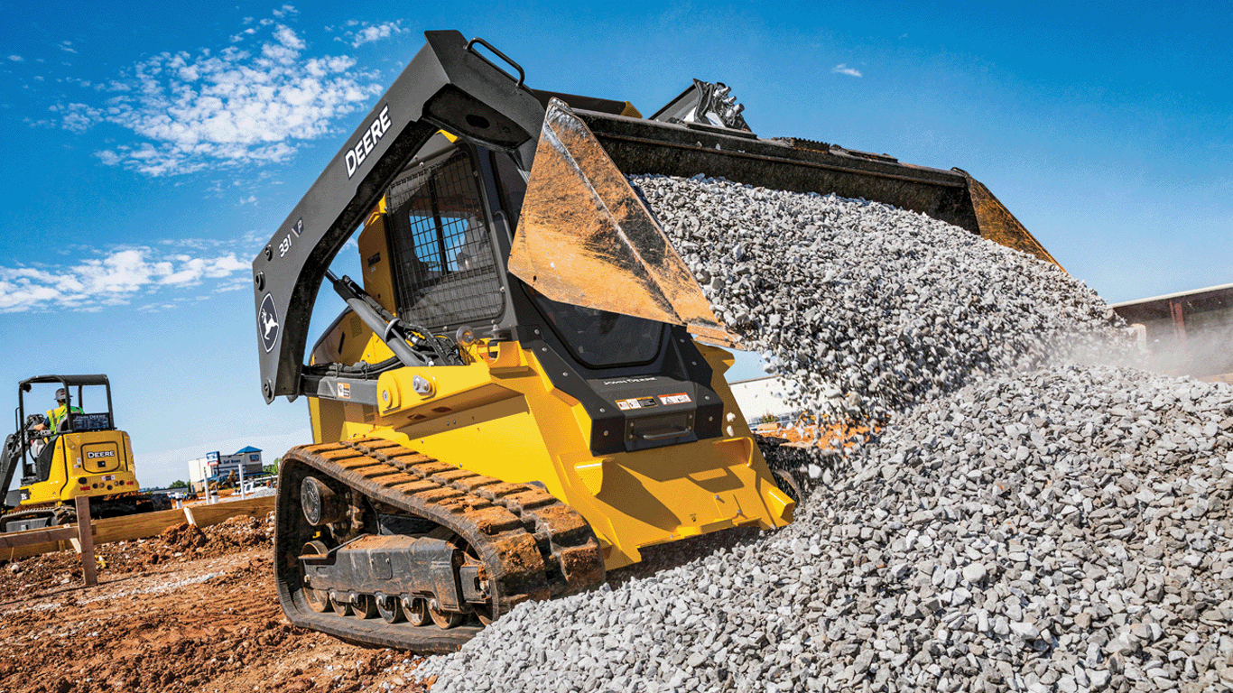 331 P-Tier compact track loader using bucket to dump gravel in a pile.