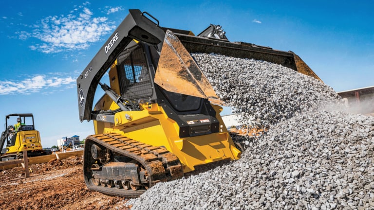 331 P-Tier compact track loader using bucket to dump gravel in a pile.