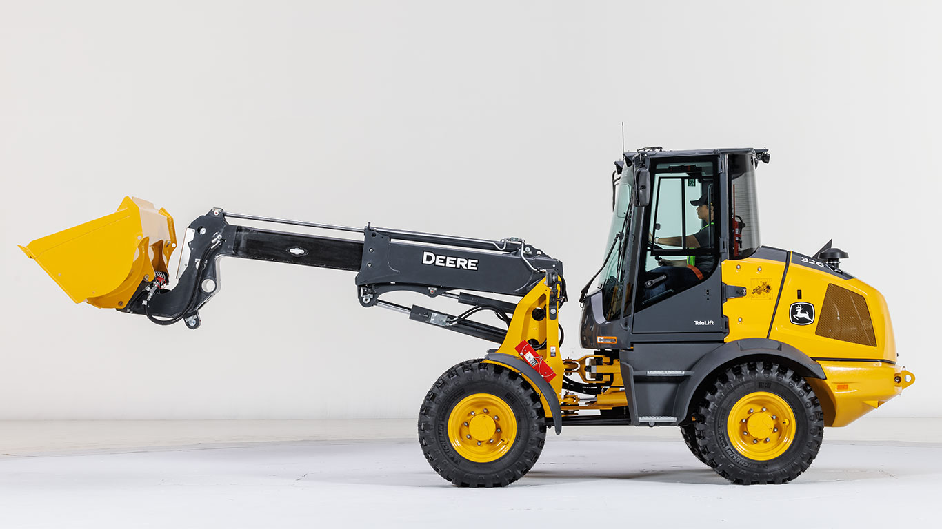 Studio image of a new John Deere 326 P-tier Telescopic Compact Wheel Loader with a bucket