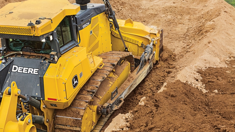 Rear-view close-up of a 950K Dozer on a worksite.