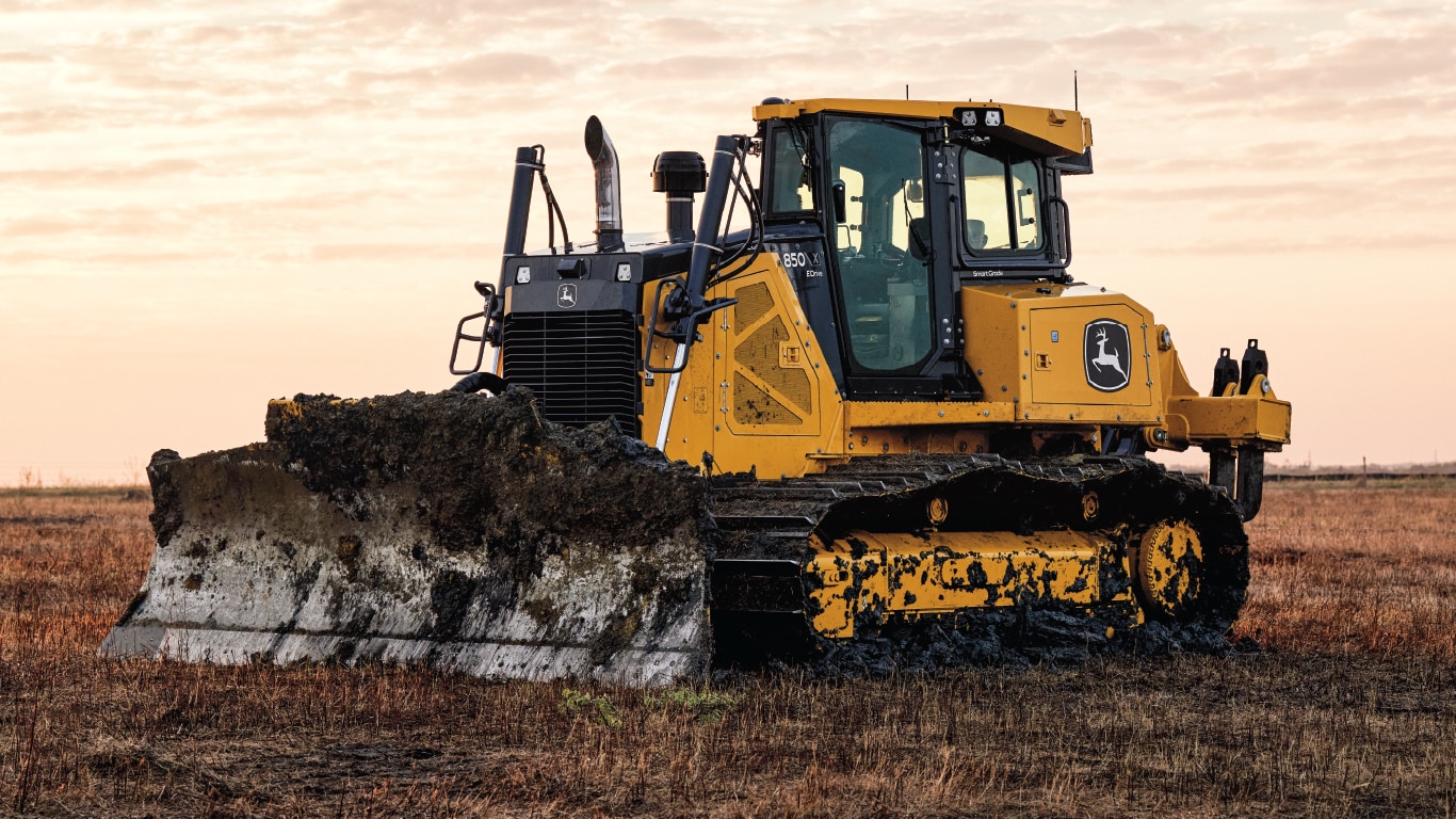 850 X-Tier dozer in field after working on job site moving dirt.
