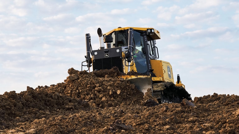 850 X-Tier dozer moving dirt on hillside