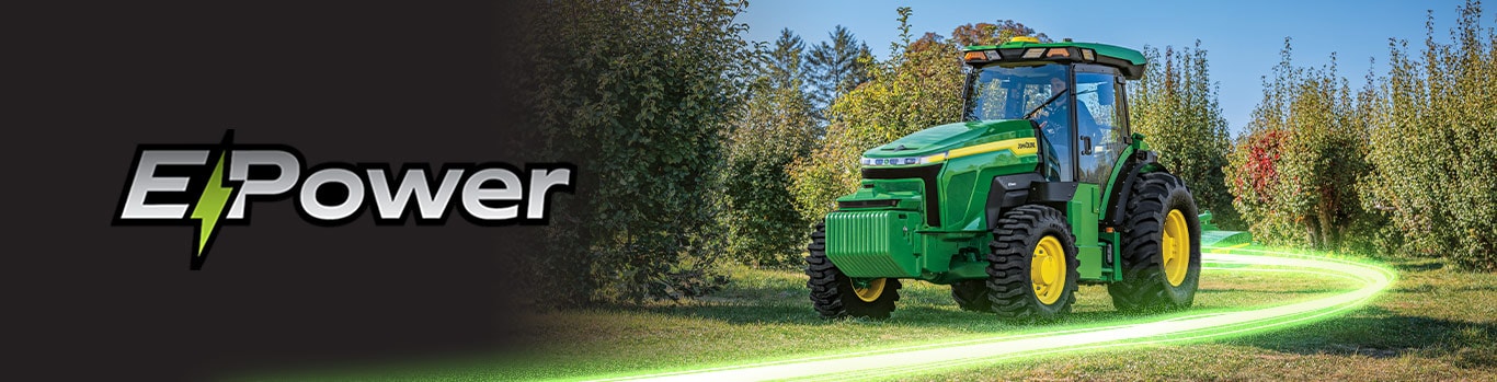 a green tractor in a clearing surrounded by trees and text saying 'E-Power'