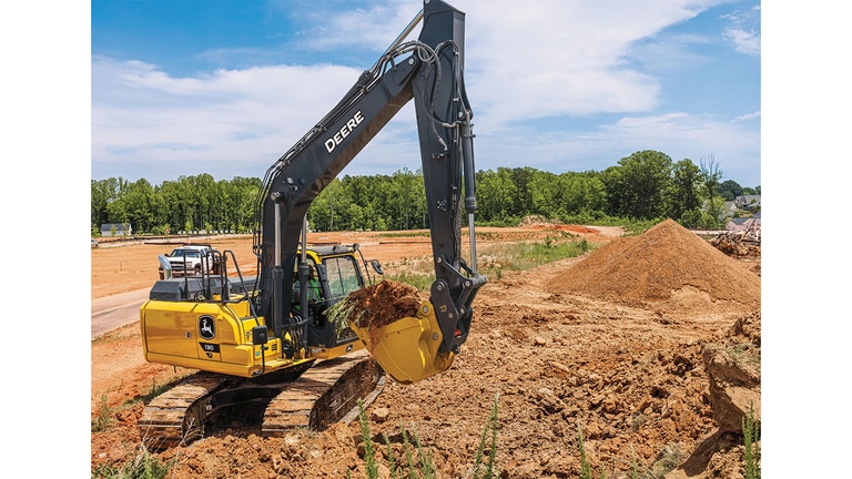 A 130P-Tier Excavator moving dirt at a worksite.
