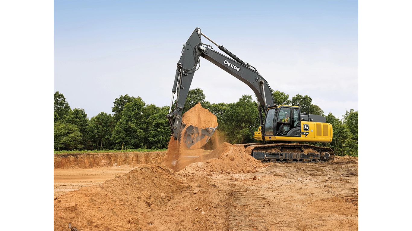 A 300P-Tier Excavator moving dirt at a worksite.