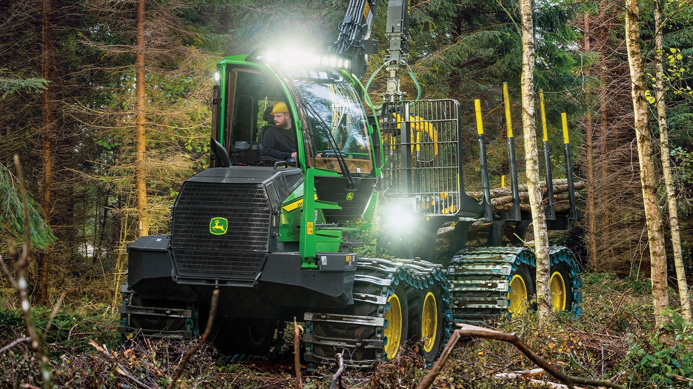 1010G forwarder hauling timber through a forest