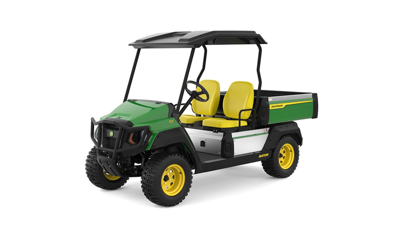 A green Gator with two yellow seats and large cargo box facing front-left on a white background.