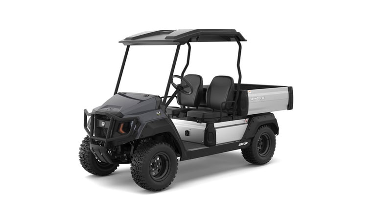 A gray Gator with two seats and large cargo box facing front-left on a white background.
